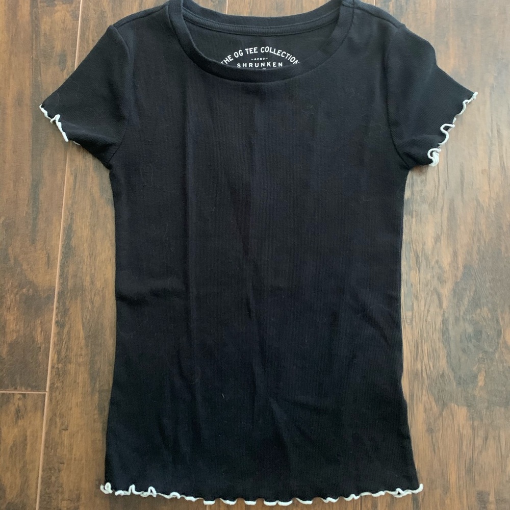 Black Aeropostale shirt with white lettuce trim